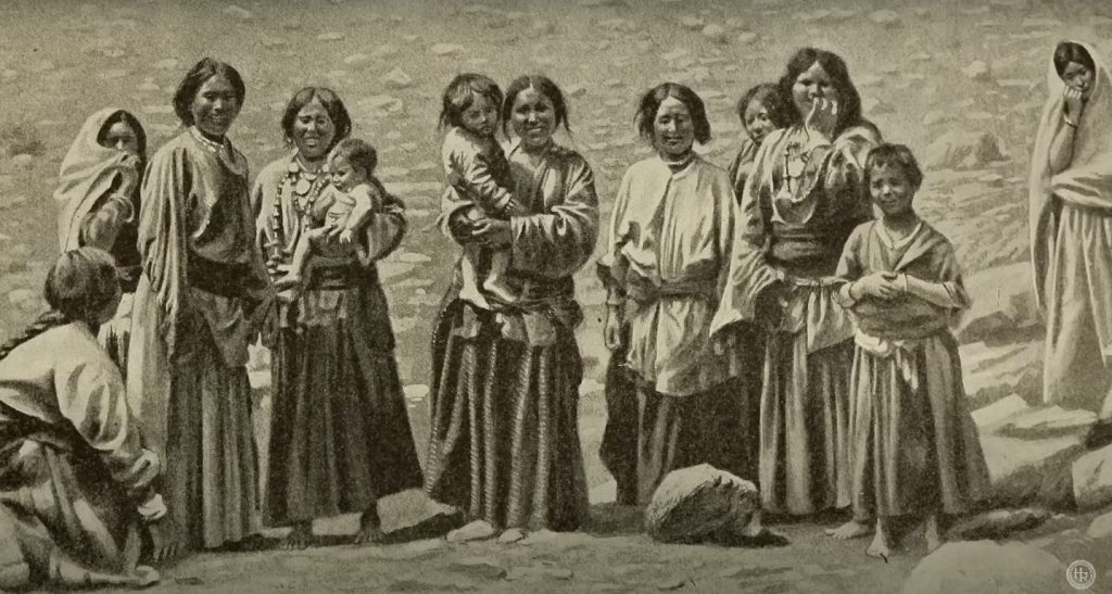 Historical photograph of the Hunny or Lama people of Tibet, captured by Lander Arnold and Henry Savage in their 1909 book 'In the Forbidden Land,' showcasing traditional attire and cultural elements.