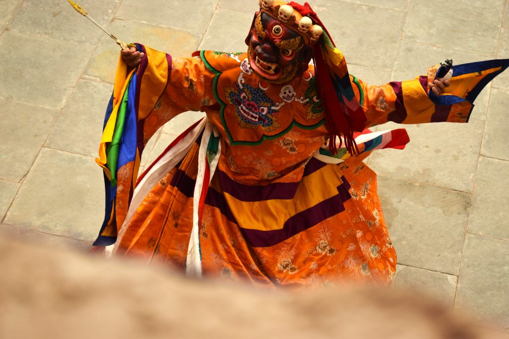 Buddhist lamas (monks) performing Chham, a masked dance in Bodh Gaya